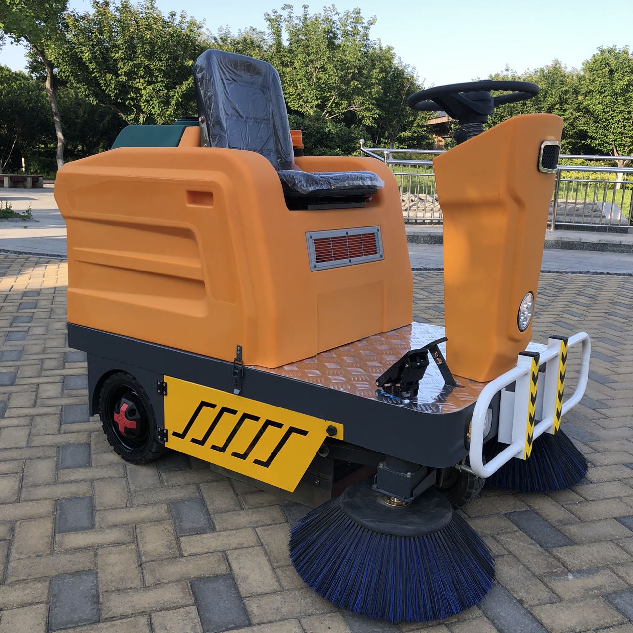 SP-1300 ride-on electric street sweeper